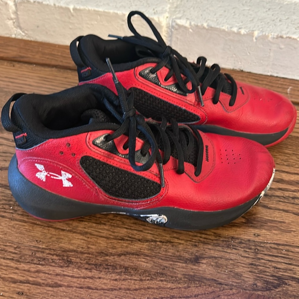 Under Armour Sneakers Youth size 4.5.  Red with black accents